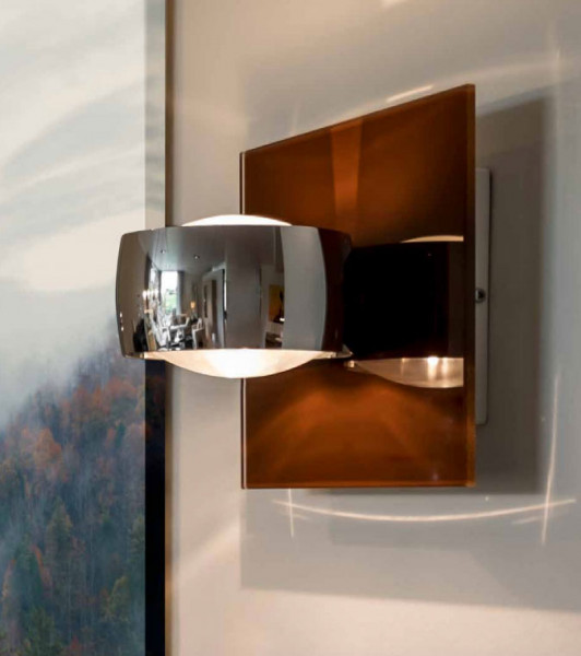 Wall lamp GRACE UNLIMITED of Oligo with head in chrome - here exemplary with optional, glass plate in tobacco