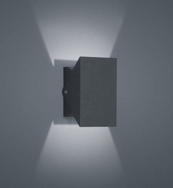 Swiveling ceiling and wall spotlight for outdoor applications in graphite surface