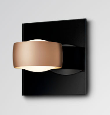 Wall lamp GRACE UNLIMITED by Oligo with head in satin copper - here with optional black glass plate