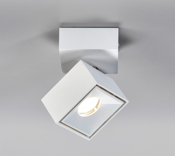 Square ceiling spotlight in a choice of white or black finish. This luminaire is dimmable and can be rotated and swiveled